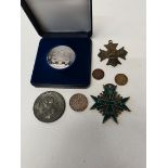 Three German medals Pour le Merite, a cased silver medal 1627 - 1977 , a Buffalo medal and German