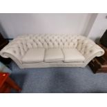 Cream leather chesterfield sofa