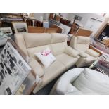 Cream leather effect 2 seater sofa and matching chair