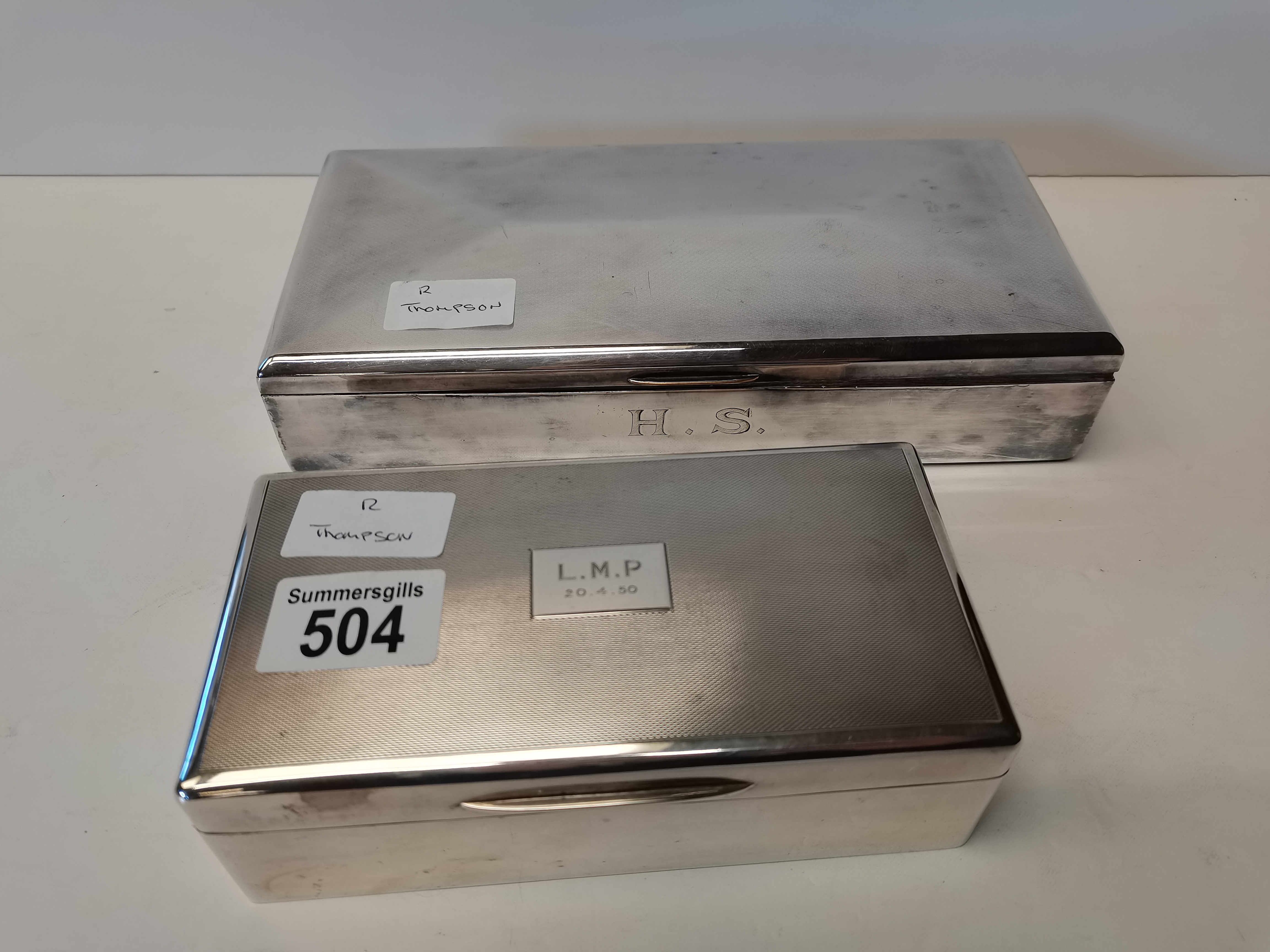 London silver cigarette box and silver plated cig. Box marked HS and State express cigaretttes