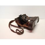 Mulber camera in leather case