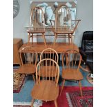 Ercol table and 6 chairs