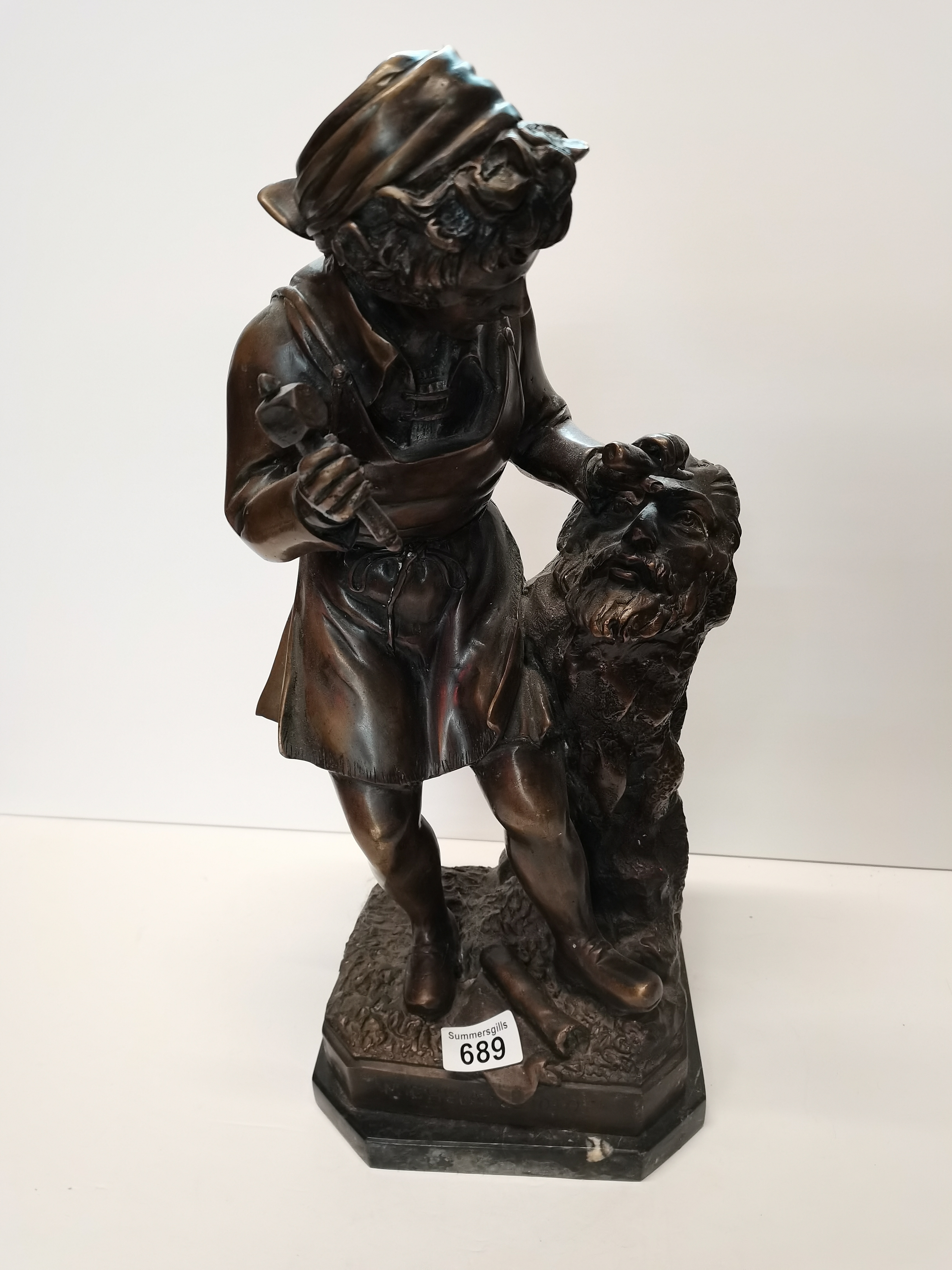 Bronze figure of girl carving