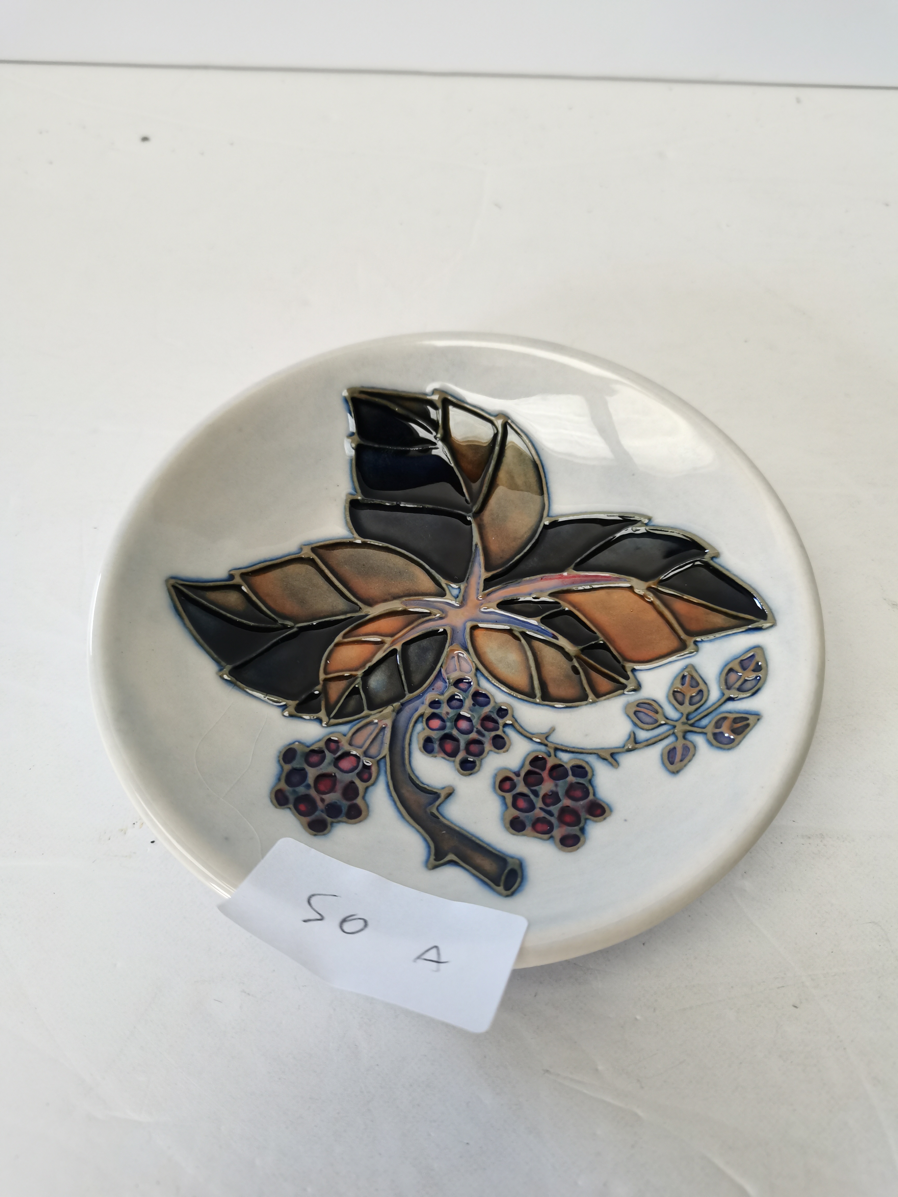 Moorcroft pin dish with blackberry decoration