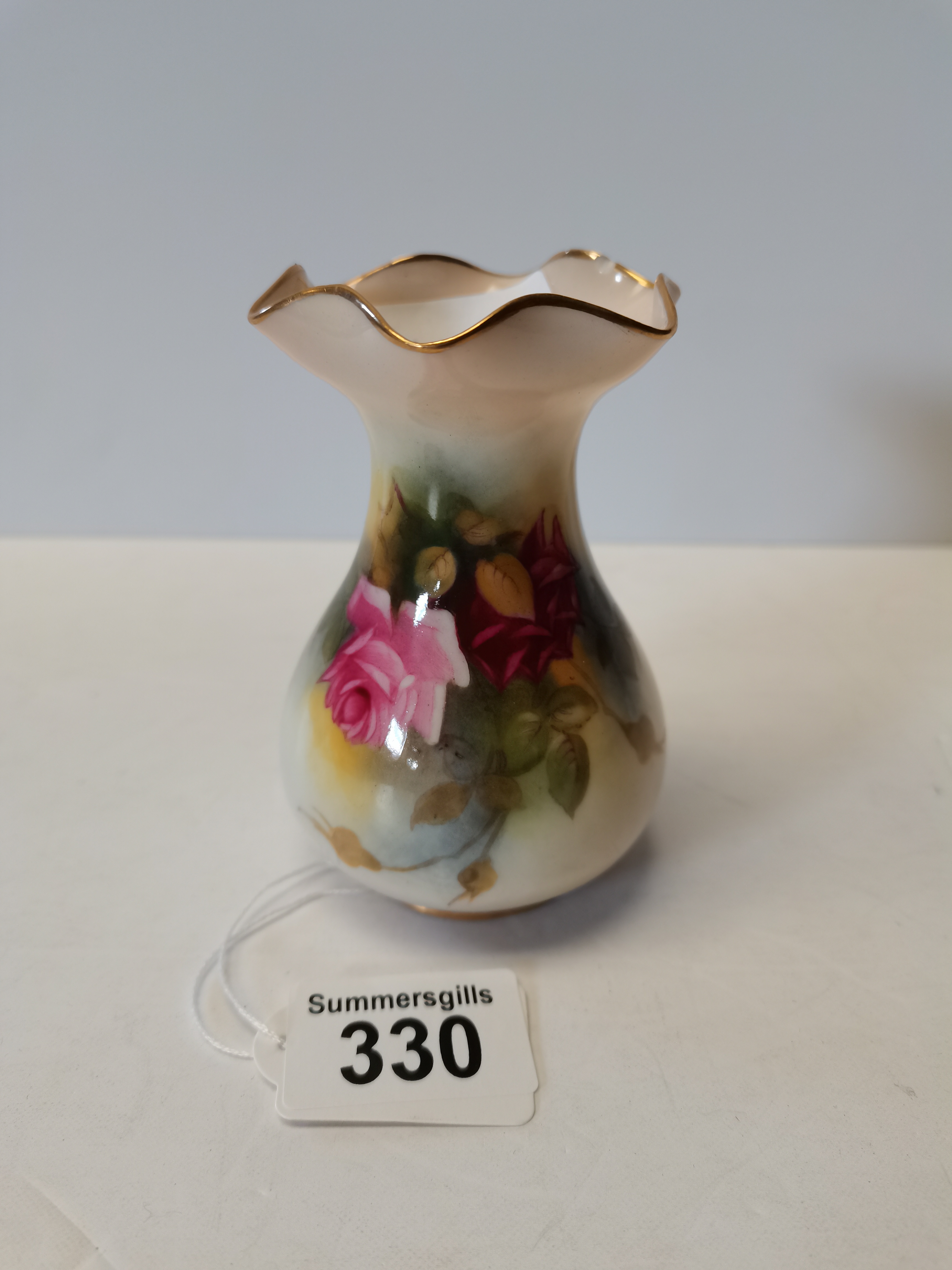 Worcester floral decorated vase with purple base mark