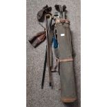 Vintage golf clubs and 2 walking sticks