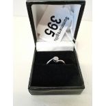 Solitaire style ring with multi stones on 9ct