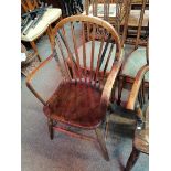 Early and unusual Windsor chair with bent arms