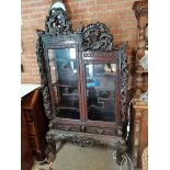 Ornate carved display unit