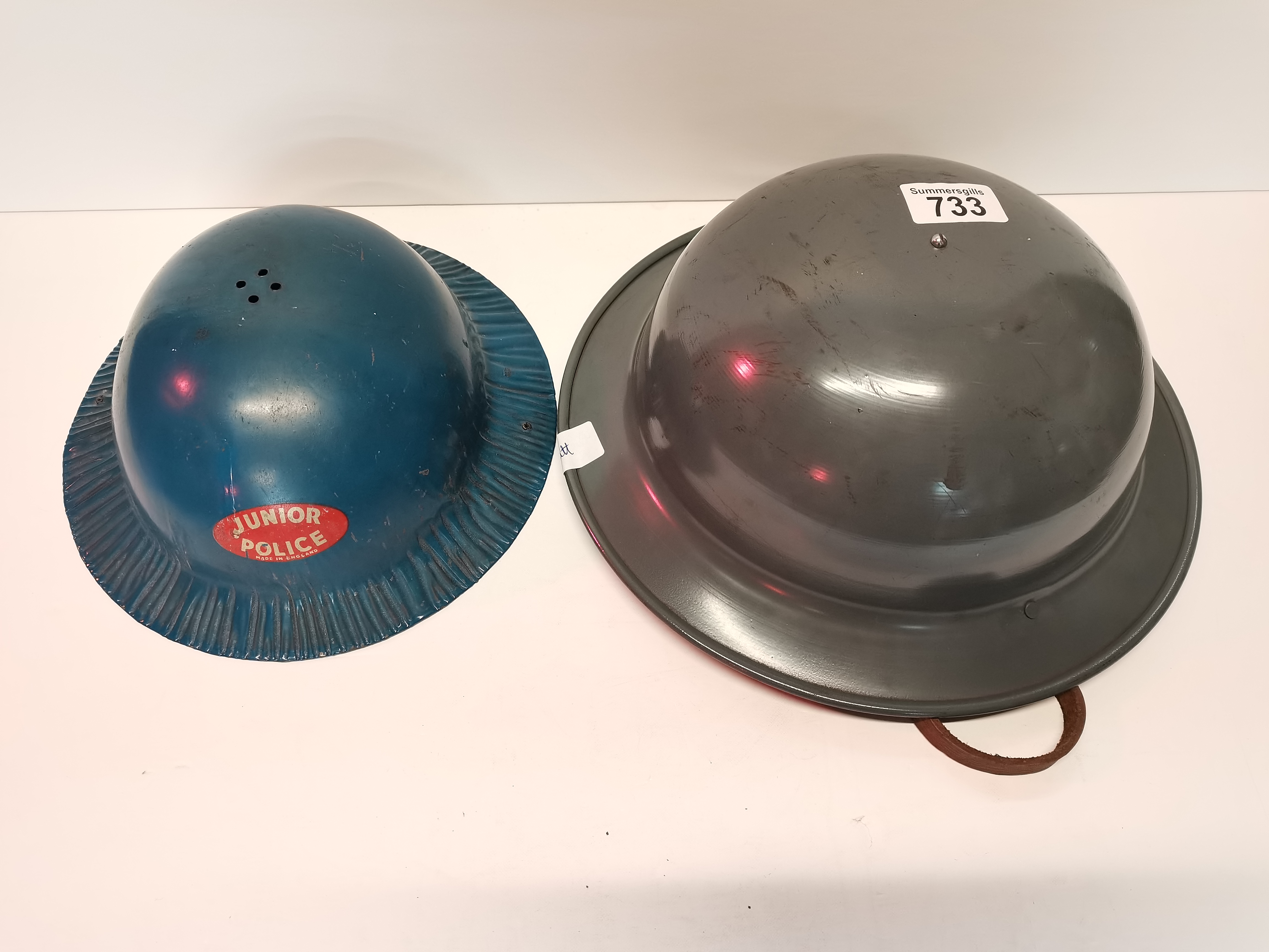 Military police doughboy helmet plus junior helmet