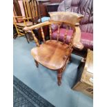 Antique smokers bow armchair
