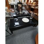 Pair of black and glass rectangular coffee tables