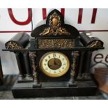 Black Mantle Clock with cherub decoration