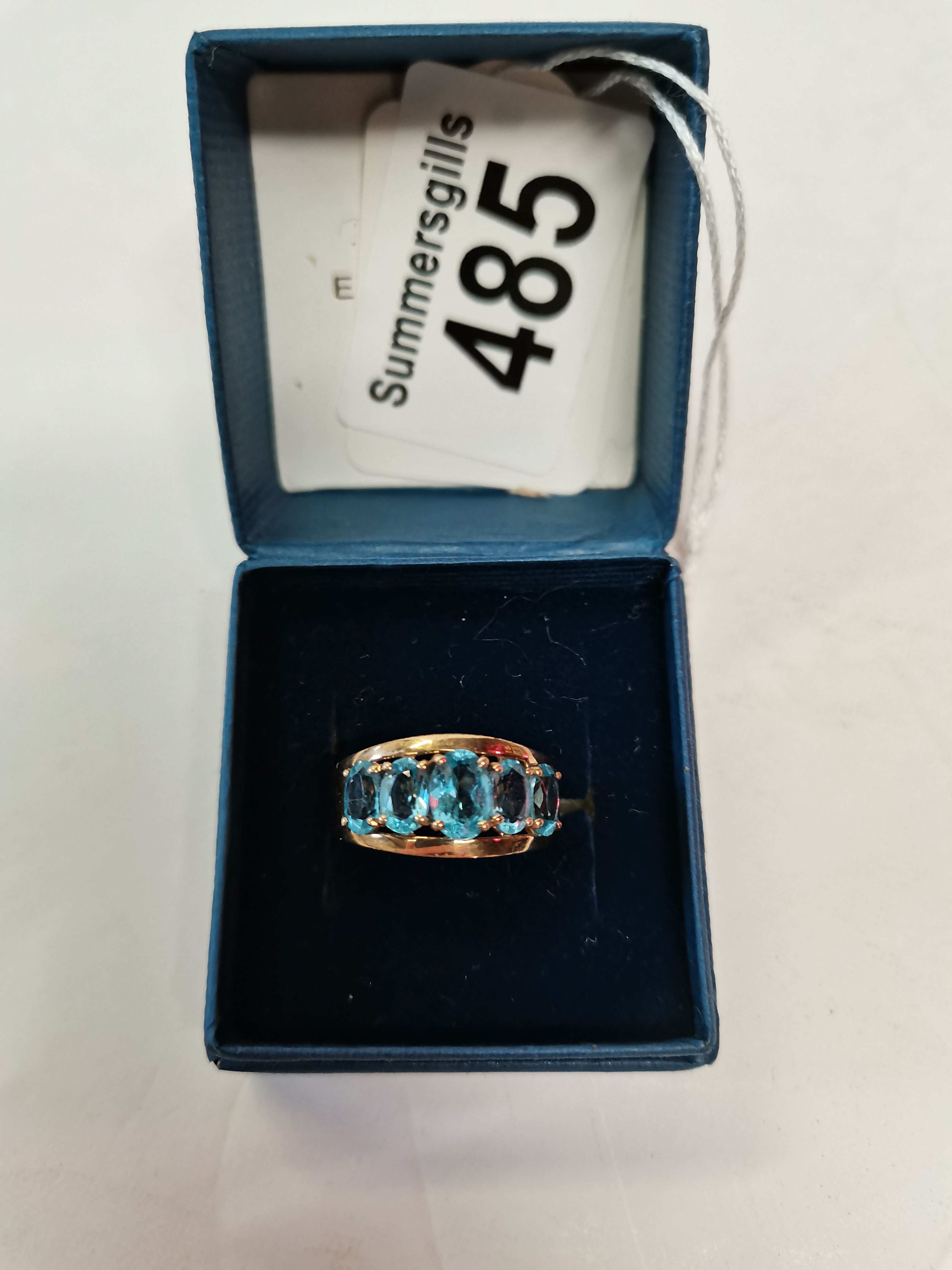 9ct gold ring with 5 oval blue stones ie aqua marine size P
