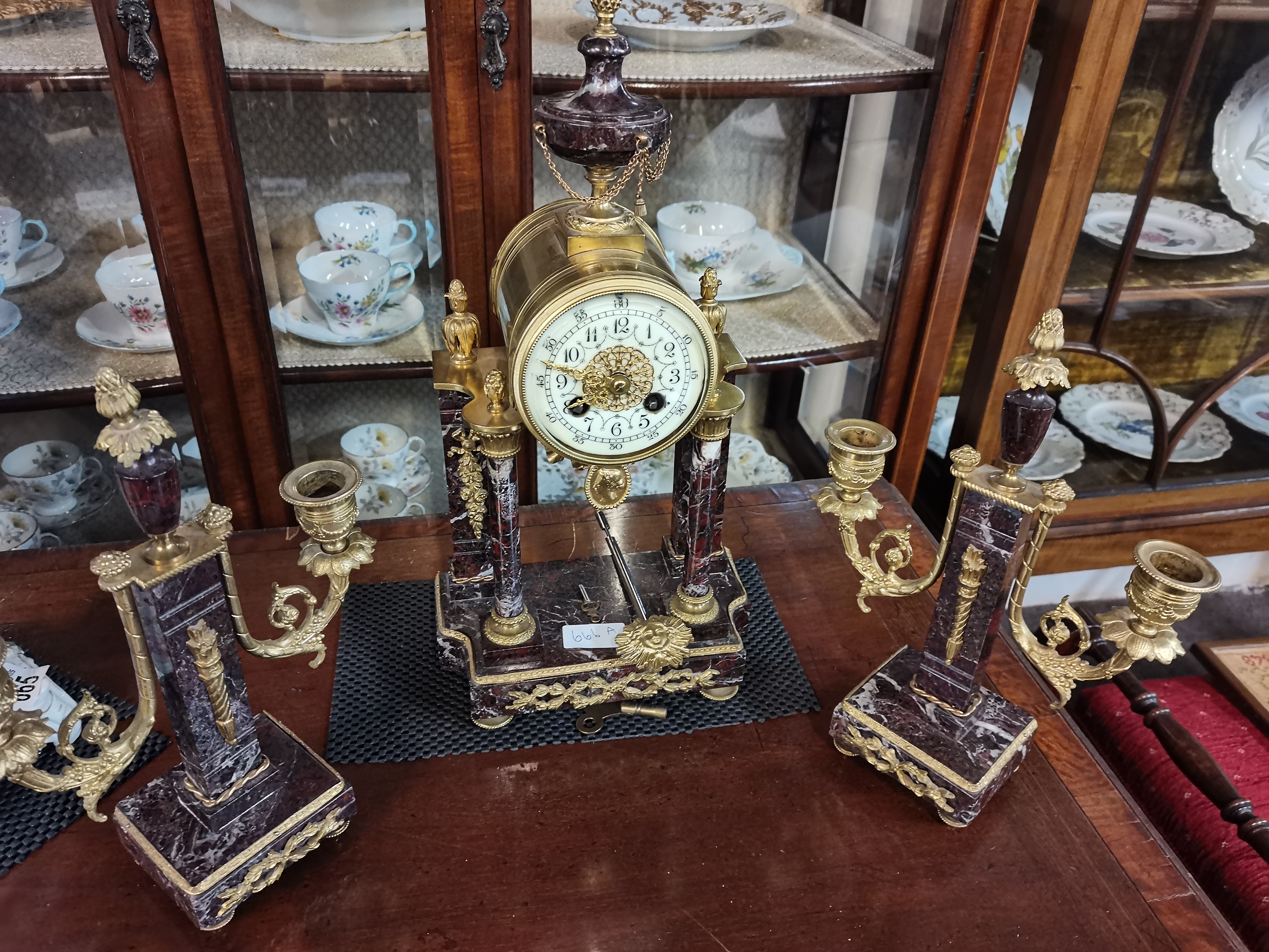 French marble and gilt clock garniture set