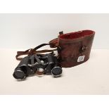 Vintage binoculars in leather case