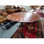 Pie crust oval table with tri-pod legs