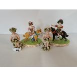 Early porcelain 2 Cherub Figures and 2 Figures of Ladies Riding Dogs ( no damage on dogs )