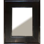 A CONTEMPORARY DEEP CUSHION LACQUERED FRAMED MIRROR With bevelled plate along with another. (87cm