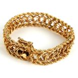 A VINTAGE 14CT GOLD ROPETWIST BRACELET With heart form clasp. (approx 18cm)
