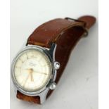 A VINTAGE RUSSIAN STAINLESS STEEL GENT'S WRISTWATCH Circular dial marked 'Cushan CCCP', on brown