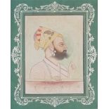 A 19TH CENTURY INDIAN MAHARAJA WATERCOLOUR PORTRAIT Profile portrait of a Sikh Maharaja wearing a