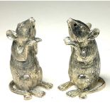 A PAIR OF CONTINENTAL SILVER 'MICE' SALT AND PEPPER POTS In opposing seated pose. (approx 5.5cm)