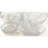 A COLLECTION OF 20TH CENTURY CUT LEAD CRYSTAL GLASS Comprising three decanters and a water jug,