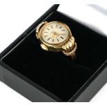 A VINTAGE 9CT GOLD WATCH RING Having a silver tone dial, marked 'Adar' (size L).