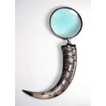 AN UNUSUAL OVERSIZED MAGNIFYING GLASS WITH A BUFFALO HORN HANDLE (l 69cm x w 42cm)