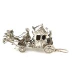 AN EARLY 20TH CENTURY CONTINENTAL SILVER CARRIAGE AND HORSES SCULPTURE Royal carriage with two