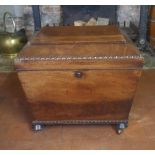 A REGENCY MAHOGANY SARCOPHAGUS FORM WINE COOLER. (60cm x 46cm x 55cm)