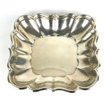 REED AND BARTON, A STERLING SILVER SHALLOW BOWL Scalloped edge with flutes, marked to base '