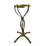 IN THE MANNER OF W.A.S. BENSON, A VICTORIAN ARTS AND CRAFTS COPPER AND BRASS STAND With copper strap
