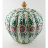 A 20TH CENTURY CHINESE FAMILLE VERTE PORCELAIN MELON FORM VASE AND COVER With flutes and decorated