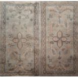 TWO PERSIAN WOOLLEN RUG With organic and geometric designs to central pale green field and running