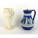 AN EARLY 20TH WEDGWOOD JASPERWARE JUG Having applied classical form decoration, together with a