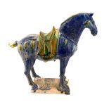 WITHDRAWN A CHINESE TANG DYNASTY DESIGN TRICOLOUR GLAZED POTTERY HORSE Standing pose, blue, green