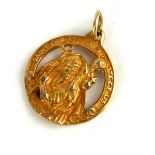 A VINTAGE 14CT GOLD ST. CHRISTOPHER MEDALLION PENDANT Having pierced figural design and Inscribed