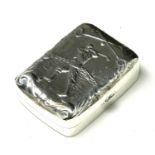 A STERLING SILVER NOVELTY 'GOLF' PILL BOX Having a hinged lid with embossed golfing scene. (approx