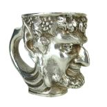 BOLIN, A LATE 19TH CENTURY RUSSIAN SILVER WINE TANKARD Heavy gauge mask of Bacchus with vine