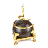 A GILT BRONZE AND MARBLE CENTREPIECE, SERPENTINE ENTWINED BALL. (35cm) Condition: good
