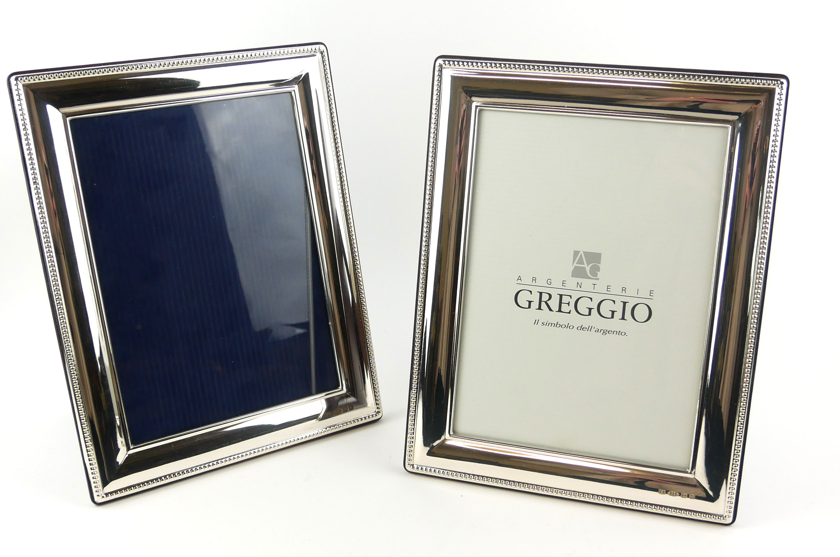 A PAIR OF MODERN SILVER RECTANGULAR PHOTOGRAPH FRAMES With beaded edges, marked 'VS .925