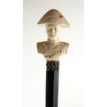 NAPOLEON, A 19TH CENTURY CARVED IVORY AND HARDWOOD WALKING STICK Having a carved bust of Napoleon