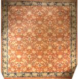 A LARGE EUROPEAN RUG OF MIDDLE EASTERN DESIGN OF CARPET PROPORTIONS Having stylised boteh to central