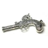A STERLING SILVER 'MUSKET' NOVELTY WHISTLE Fine engraved pistol of 18th Century form. (approx 6cm)