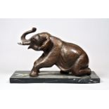 A 20TH CENTURY BRONZE ELEPHANT UPON A MARBLE BASE (h 24cm x w 38cm x d 15.5cm)