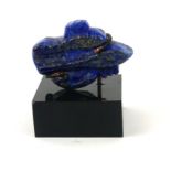 A CARVED LAPIS LAZULI EGYPTIAN EYE OF HORUS SCULPTURE Fine carving in wire frame and perspex