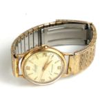 ACCURIST, A VINTAGE 9CT GOLD GENT'S WRISTWATCH Having cream to dial marked 'Antimagnetic' on gold