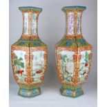 A PAIR OF CHINESE FACETED BALUSTER VASES Panels decorated with animals in landscapes amongst